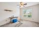 Bedroom with window and ceiling fan at 605 Pebble Blvd, Covington, GA 30016
