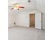Large bonus room featuring an open doorway, and a ceiling fan, offering flexibility for various living or recreation needs at 605 Pebble Blvd, Covington, GA 30016
