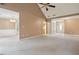 Spacious living room with an open floor plan connecting to other living areas at 605 Pebble Blvd, Covington, GA 30016