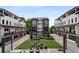 Overhead shot of contemporary townhomes with attractive exteriors, green spaces, and inviting outdoor seating areas at 2347 Hosea L Williams Ne Dr # 11, Atlanta, GA 30317