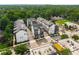 Aerial showcasing contemporary townhomes featuring inviting courtyards, landscaped surroundings, and convenient neighborhood streets at 2347 Hosea L Williams Ne Dr # 11, Atlanta, GA 30317
