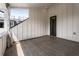 Sunny balcony with elegant white trim and modern plank flooring at 2347 Hosea L Williams Ne Dr # 11, Atlanta, GA 30317