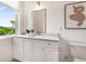 Bathroom featuring a white vanity with marble countertops and modern decor at 2347 Hosea L Williams Ne Dr # 11, Atlanta, GA 30317