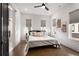 Bedroom with hardwood floors, natural light, ceiling fan, and ensuite bathroom at 2347 Hosea L Williams Ne Dr # 11, Atlanta, GA 30317