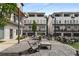 Inviting courtyard with stylish seating, perfect for relaxing or entertaining outdoors and charming townhome facades at 2347 Hosea L Williams Ne Dr # 11, Atlanta, GA 30317
