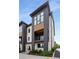 Striking townhome showcasing a modern design with a private balcony and contemporary materials at 2347 Hosea L Williams Ne Dr # 11, Atlanta, GA 30317