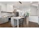 Modern kitchen features a large island, stainless steel appliances, and sleek gray cabinetry at 2347 Hosea L Williams Ne Dr # 11, Atlanta, GA 30317