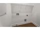 Neutral laundry room with hookups and room for shelving at 2347 Hosea L Williams Ne Dr # 11, Atlanta, GA 30317