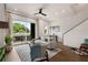 Bright living room boasts a balcony with scenic views and chic, modern furniture at 2347 Hosea L Williams Ne Dr # 11, Atlanta, GA 30317