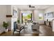 Inviting living room features a cozy fireplace, balcony access, and stylish decor at 2347 Hosea L Williams Ne Dr # 11, Atlanta, GA 30317