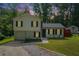 Beautiful home with black shutters and manicured lawn, providing a welcoming curb appeal at 3012 Dempsey Pl, Lawrenceville, GA 30044