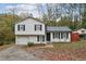 Charming two-story home with a well-manicured front yard and driveway at 3012 Dempsey Pl, Lawrenceville, GA 30044