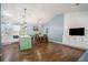 Bright, open living space featuring modern decor, hardwood floors, and ample natural light at 3012 Dempsey Pl, Lawrenceville, GA 30044