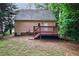 The backyard features a small deck, lawn, and house at 3135 Washington Rd, Atlanta, GA 30344