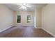 Carpeted bedroom with natural light coming in through the windows at 3135 Washington Rd, Atlanta, GA 30344