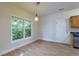 Bright dining area with views of the trees outside of the large window at 3135 Washington Rd, Atlanta, GA 30344