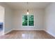 Bright dining room with views of the trees outside of the large window at 3135 Washington Rd, Atlanta, GA 30344