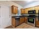 Kitchen with stainless steel appliances and bright natural light at 3135 Washington Rd, Atlanta, GA 30344