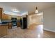 Open kitchen with stainless steel appliances and eat-in area nearby at 3135 Washington Rd, Atlanta, GA 30344