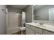 Bright bathroom with a shower and tub combination and a white vanity at 4424 High Gate Nw Dr, Acworth, GA 30101