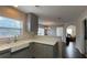 Bright kitchen features white countertops, gray cabinets, and stainless steel appliances at 4424 High Gate Nw Dr, Acworth, GA 30101