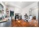 Well-lit kitchen featuring white cabinets, stainless steel appliances, and hardwood floors at 451 S Columbia Dr, Decatur, GA 30030
