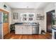 Bright kitchen featuring stainless steel appliances, dark countertops, and ample natural light at 451 S Columbia Dr, Decatur, GA 30030