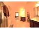 Primary bath featuring separate glass shower, double sinks and doorway to bedroom at 560 Tuscany Walk Ln, Lawrenceville, GA 30043