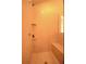 Tiled shower with corner shelves and seat at 560 Tuscany Walk Ln, Lawrenceville, GA 30043