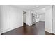 Spacious bedroom with ample closet space, seamlessly connected to a modern kitchen area, blending comfort and convenience at 2123 Drew Valley Ne Rd, Brookhaven, GA 30319