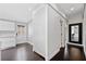 Hallway featuring stylish cabinetry and a door leading to the exterior of the home at 2123 Drew Valley Ne Rd, Brookhaven, GA 30319