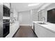 Elegant kitchen with modern appliances, quartz countertops, and a functional layout for efficient cooking at 2123 Drew Valley Ne Rd, Brookhaven, GA 30319