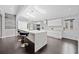 Modern kitchen with large island, quartz countertops, stainless steel appliances, and skylights providing natural light at 2123 Drew Valley Ne Rd, Brookhaven, GA 30319
