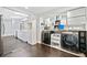 Efficient laundry setup adjacent to the kitchen, offering convenience with modern appliances and ample storage at 2123 Drew Valley Ne Rd, Brookhaven, GA 30319