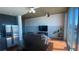 Open-concept living room with hardwood floors, modern lighting, and floor-to-ceiling windows at 361 17Th Nw St # 1717, Atlanta, GA 30363