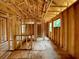 Unfinished interior hallway showing wood framework, and the layout of the home at 731 Crest Line Trl, Powder Springs, GA 30127