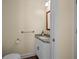 Bathroom featuring granite countertop, white vanity, and modern fixtures at 2058 Sewanee Ct, Villa Rica, GA 30180
