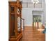 Inviting entryway with hardwood floors and grand staircase at 2058 Sewanee Ct, Villa Rica, GA 30180