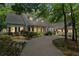 Charming home with a large front yard and inviting front porch at 2058 Sewanee Ct, Villa Rica, GA 30180