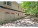 View of the attached four-car garage with white doors at 2058 Sewanee Ct, Villa Rica, GA 30180