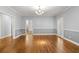 Spacious living room showcases hardwood floors and neutral color palette at 2058 Sewanee Ct, Villa Rica, GA 30180