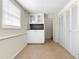 Functional basement featuring a storage area, closet, carpet, and a window for natural light at 2135 Knighton Dr, Atlanta, GA 30349