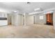 Finished basement with a unique orange fireplace, storage, and access to a bathroom at 2135 Knighton Dr, Atlanta, GA 30349