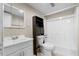 Cozy full bathroom features a single sink vanity, toilet, and a shower tub combo at 2135 Knighton Dr, Atlanta, GA 30349