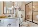 Bright bathroom featuring a shower-tub combination, toilet, and a white vanity with granite countertop at 2450 Weber Heights Way, Buford, GA 30519