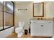 Cozy bathroom featuring a shower-tub combo, toilet, and white vanity with granite countertop at 2450 Weber Heights Way, Buford, GA 30519
