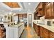 Well-appointed kitchen featuring granite countertops, a center island, and stainless steel appliances at 2450 Weber Heights Way, Buford, GA 30519