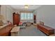 Bedroom view with plantation shutters, ceiling fan, hardwood floors, and neutral paint at 251 Beverly Ne Rd, Atlanta, GA 30309