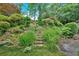 Beautiful stone steps and a colorful landscaped garden lead to the home at 251 Beverly Ne Rd, Atlanta, GA 30309