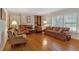Bright living room with hardwood floors, fireplace, and comfortable seating at 251 Beverly Ne Rd, Atlanta, GA 30309